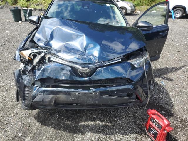 JTMBFREV4JJ244648 - 2018 TOYOTA RAV4 LE ლურჯი ფოტო 12