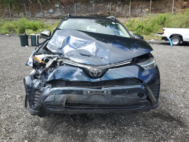 JTMBFREV4JJ244648 - 2018 TOYOTA RAV4 LE ლურჯი ფოტო 5