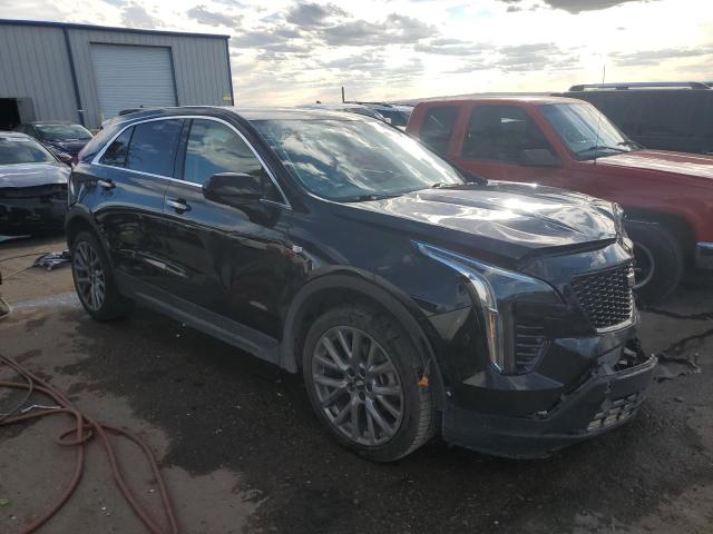 1GYAZAR43MF050409 - 2021 CADILLAC XT4 LUXURY BLACK photo 4