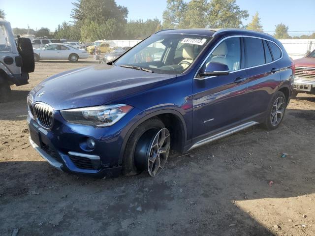 WBXHT3C39H5F70486 - 2017 BMW X1 XDRIVE28I BLUE photo 1