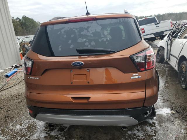 1FMCU9G99HUB25637 - 2017 FORD ESCAPE SE ORANGE photo 6