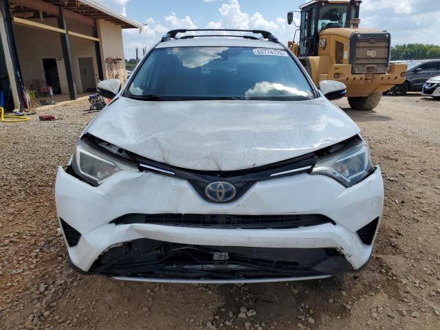 JTMRJREV7JD193478 - 2018 TOYOTA RAV4 HV LE Белый фото 5