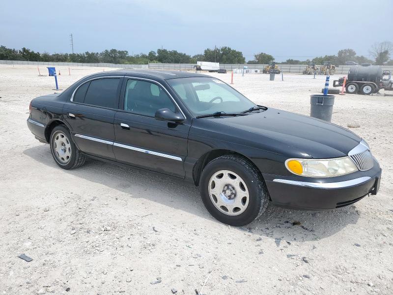 1LNHM97V9XY634170 - 1999 LINCOLN CONTINENTA შავი ფოტო 4