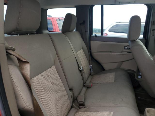 1J8GN28K99W524171 - 2009 JEEP LIBERTY SPORT RED photo 10