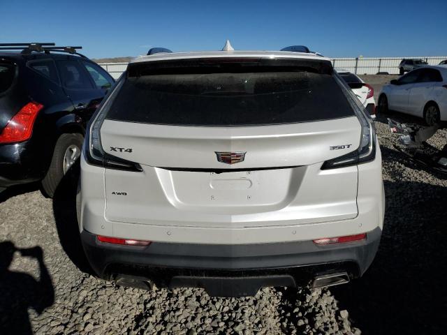 1GYFZFR45PF100332 - 2023 CADILLAC XT4 SPORT WHITE photo 6