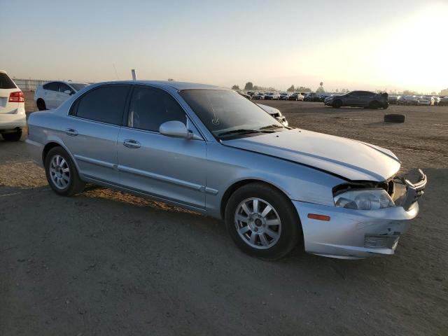 KNAGD128325099279 - 2002 KIA OPTIMA MAGENTIS SILVER photo 4