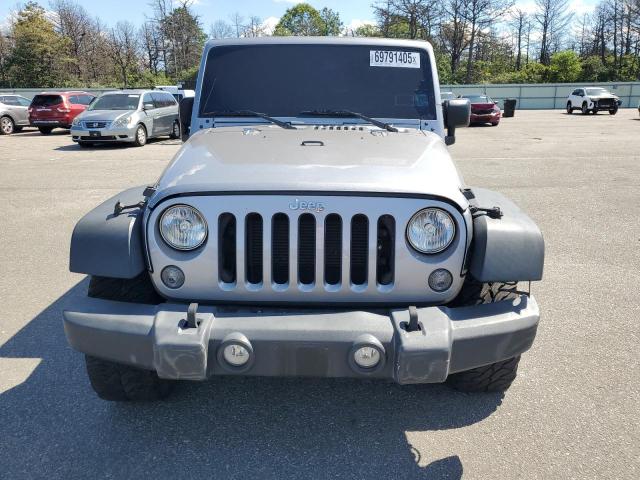 1C4HJWDG2GL346148 - 2016 JEEP WRANGLER U SPORT SILVER photo 5