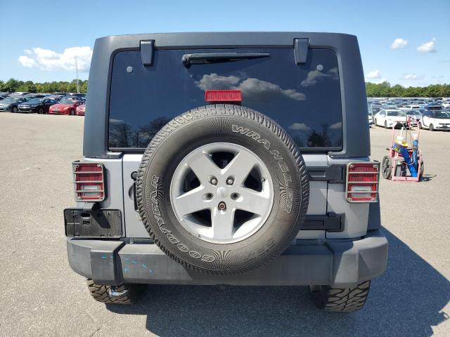 1C4HJWDG2GL346148 - 2016 JEEP WRANGLER U SPORT SILVER photo 6