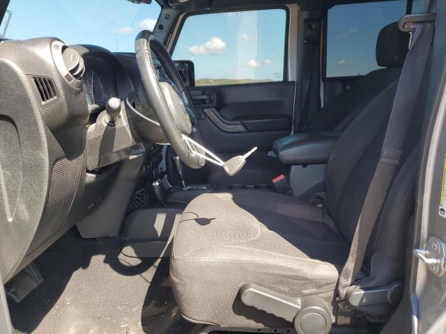 1C4HJWDG2GL346148 - 2016 JEEP WRANGLER U SPORT SILVER photo 7