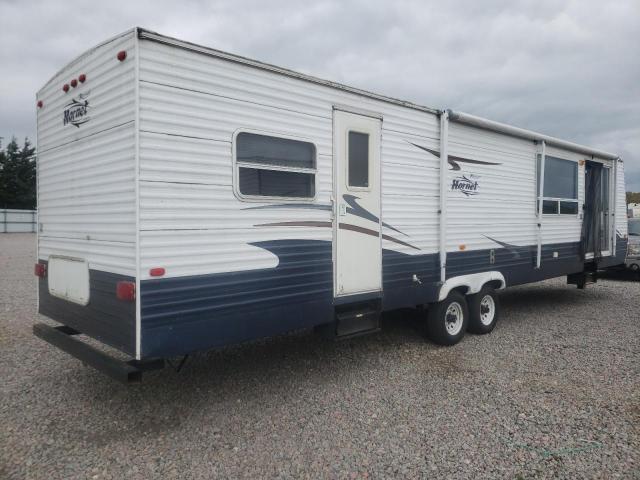 4YDT38F2777200027 - 2007 KEYSTONE HORNET WHITE photo 4