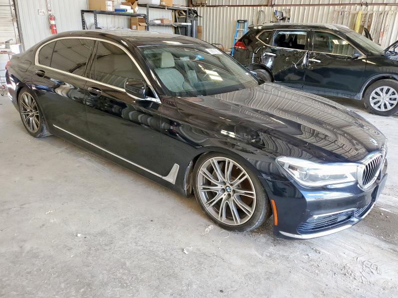 WBA7F0C55HGM21314 - 2017 BMW 750 I BLUE photo 4