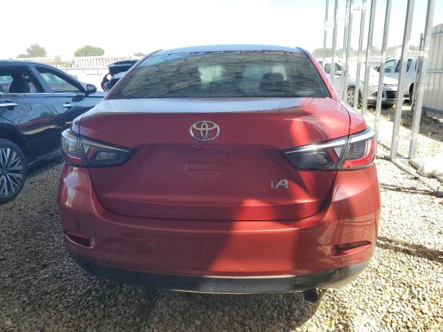 3MYDLBYV2JY302029 - 2018 TOYOTA YARIS IA Rot Foto 6