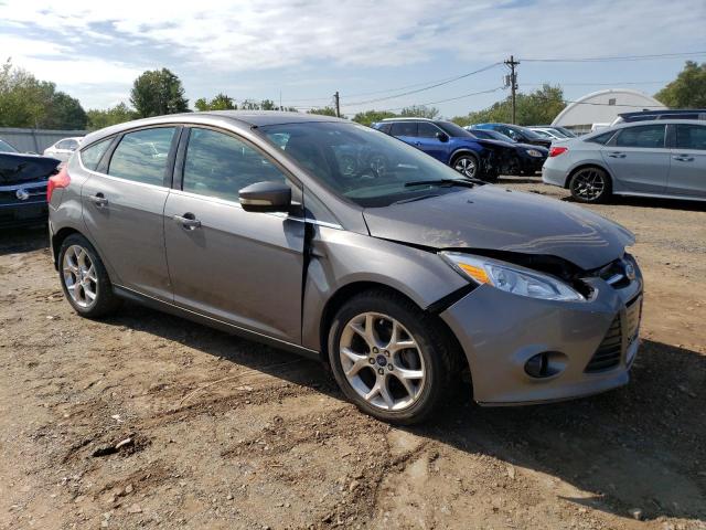 1FAHP3N24CL187603 - 2012 FORD FOCUS TITANIUM GRAY photo 4