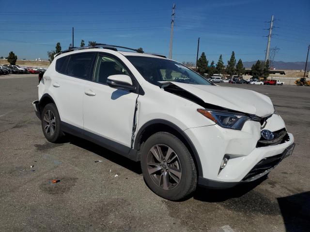 JTMWFREV9GD085148 - 2016 TOYOTA RAV4 XLE WHITE photo 4