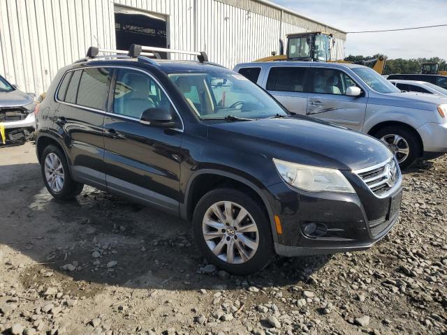 WVGAV75N09W500104 - 2009 VOLKSWAGEN TIGUAN S BLACK photo 4