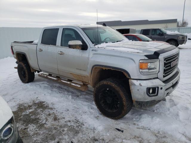 1GT12TEG7HF110591 - 2017 GMC SIERRA K2500 SLT GRAY photo 4