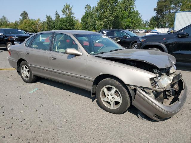 4T1BF18B5XU296408 - 1999 TOYOTA AVALON XL TAN photo 4