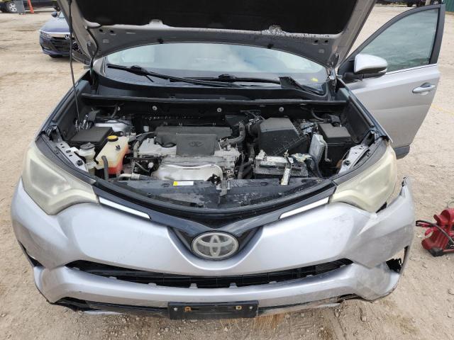2T3WFREVXHW397628 - 2017 TOYOTA RAV4 XLE SILVER photo 11