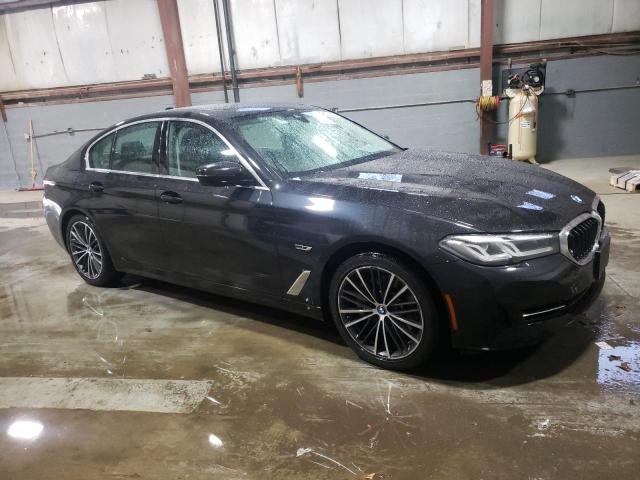 WBA33AG00NCK57985 - 2022 BMW 530XE BLACK photo 4