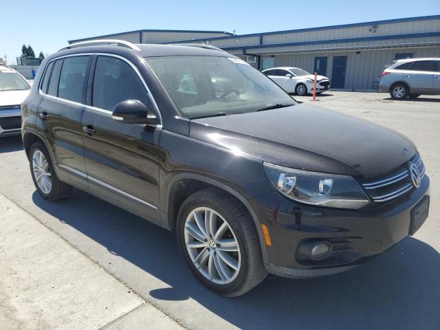WVGAV3AX2EW540954 - 2014 VOLKSWAGEN TIGUAN S BLACK photo 4