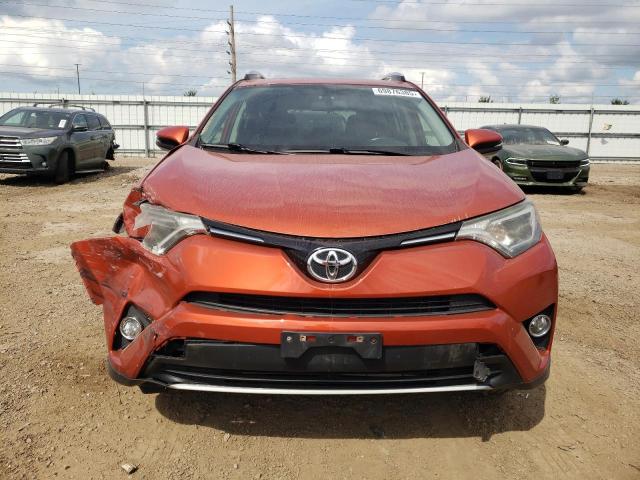 JTMWFREV5GJ099744 - 2016 TOYOTA RAV4 XLE ORANGE photo 5