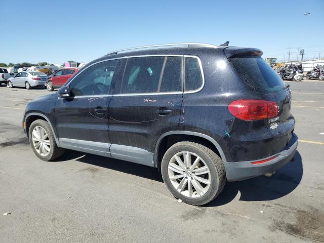 WVGBV7AX9CW548767 - 2012 VOLKSWAGEN TIGUAN S BLACK photo 2