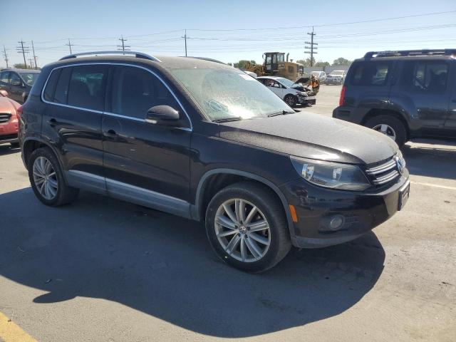 WVGBV7AX9CW548767 - 2012 VOLKSWAGEN TIGUAN S BLACK photo 4
