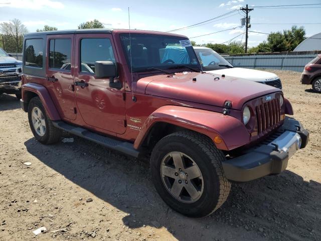 1J4HA5H15BL588418 - 2011 JEEP WRANGLER U SAHARA RED photo 4