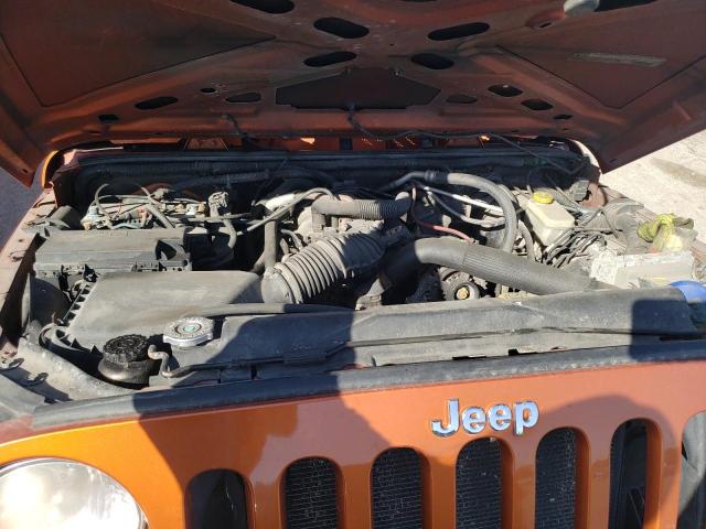 1J4BA3H12BL626178 - 2011 JEEP WRANGLER U SPORT ORANGE photo 11