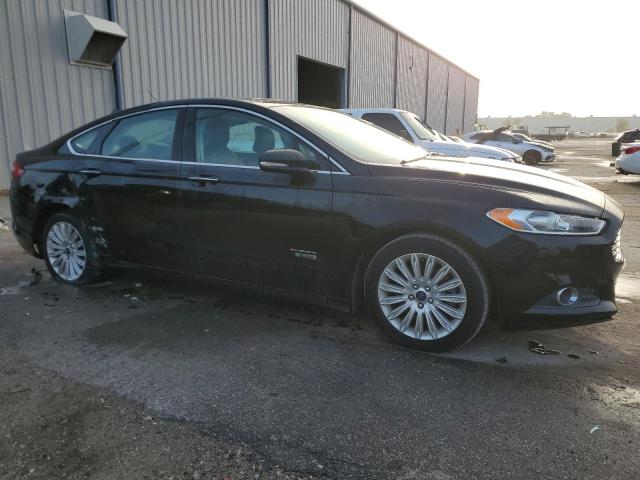 3FA6P0PU2GR265355 - 2016 FORD FUSION SE PHEV BLACK photo 4