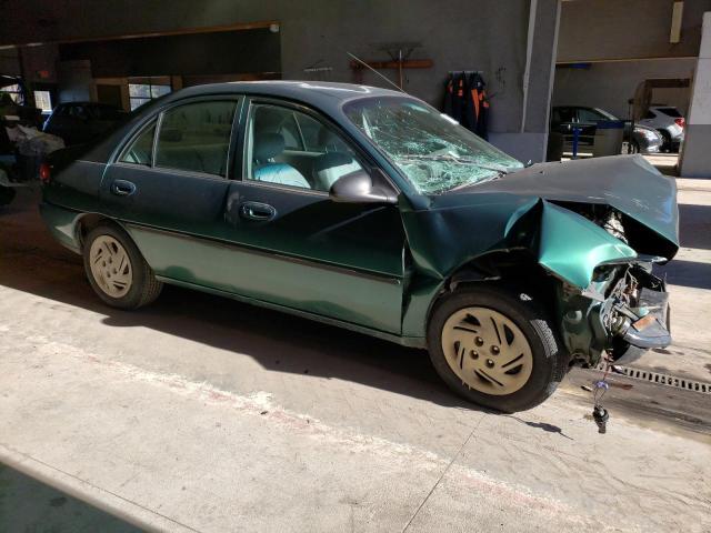 1FAFP10P4XW285887 - 1999 FORD ESCORT LX GREEN photo 4