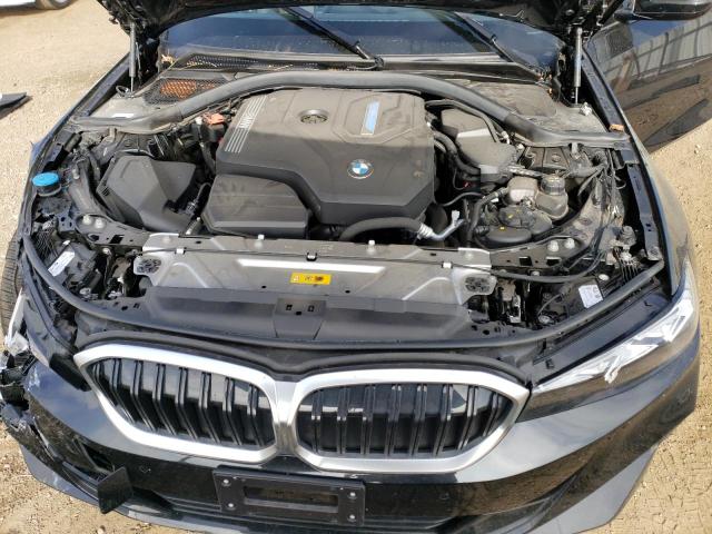 3MW39FF02P8C89943 - 2023 BMW 330E BLACK photo 11