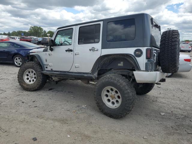 1J4BA5H15AL123254 - 2010 JEEP WRANGLER U SAHARA SILVER photo 2