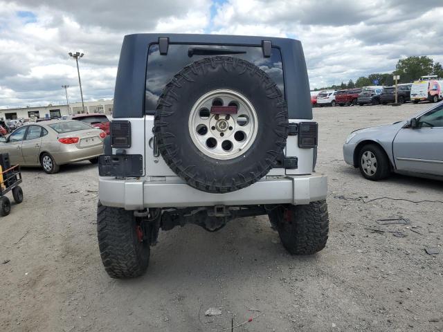 1J4BA5H15AL123254 - 2010 JEEP WRANGLER U SAHARA SILVER photo 6