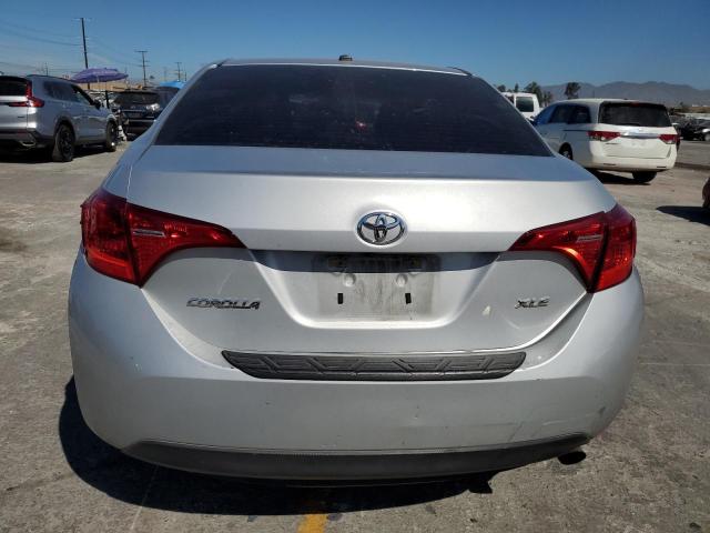 5YFBURHE8JP759973 - 2018 TOYOTA COROLLA L SILVER photo 6