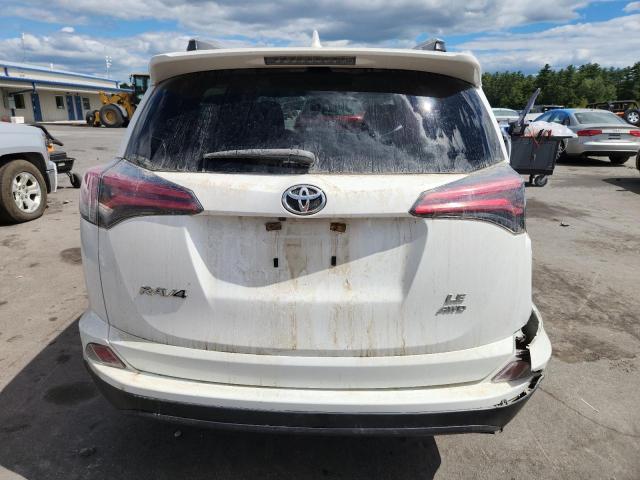 JTMBFREVXHJ136299 - 2017 TOYOTA RAV4 LE WHITE photo 6