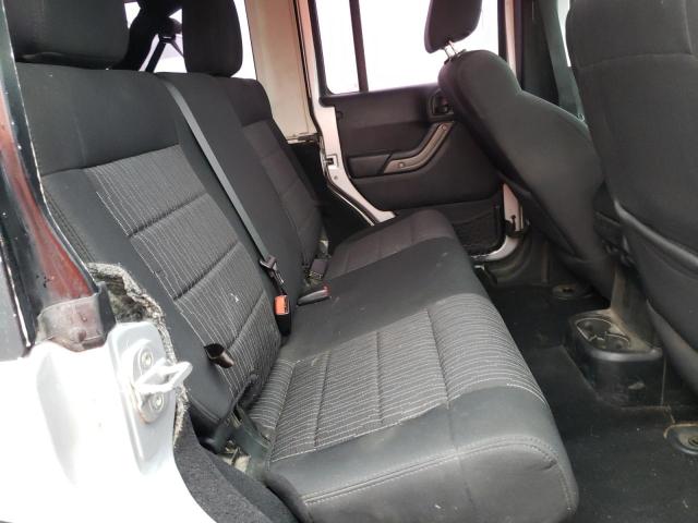 1C4BJWKG5CL267799 - 2012 JEEP WRANGLER U SPORT ვერცხლისფერი ფოტო 11