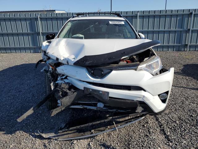 JTMRJREVXJD209303 - 2018 TOYOTA RAV4 HV LE WHITE photo 5