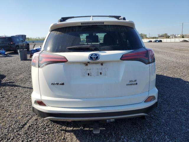 JTMRJREVXJD209303 - 2018 TOYOTA RAV4 HV LE WHITE photo 6