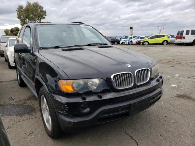 5UXFB33532LH36768 - 2002 BMW X5 4.4I BLACK photo 4