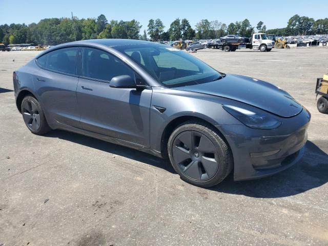 5YJ3E1EA1PF656838 - 2023 TESLA MODEL 3 Серый фото 4