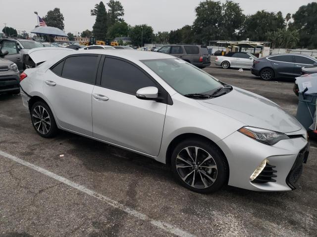 5YFBURHE4KP912091 - 2019 TOYOTA COROLLA L SILVER photo 4