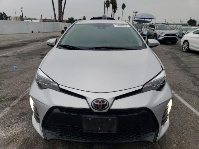 5YFBURHE4KP912091 - 2019 TOYOTA COROLLA L SILVER photo 5