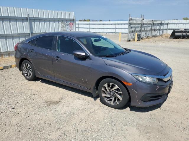 2HGFC2F52GH526590 - 2016 HONDA CIVIC LX ნაცრისფერი ფოტო 4