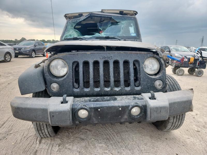 1C4BJWDGXGL286626 - 2016 JEEP WRANGLER U SPORT Grafit foto 5