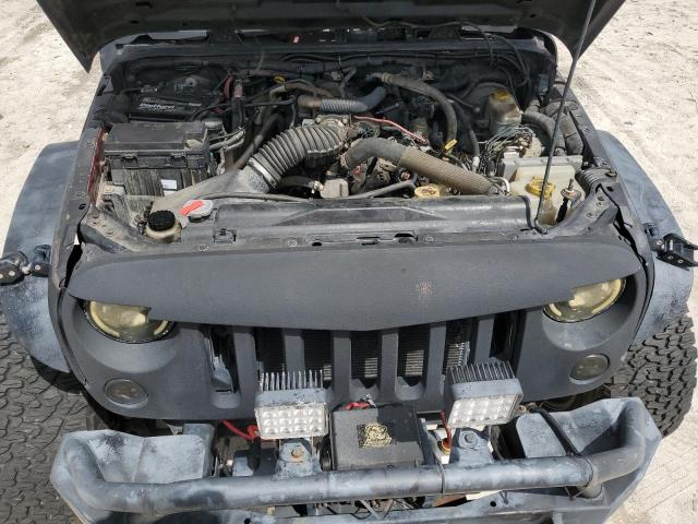 1J4BA5H10AL144027 - 2010 JEEP WRANGLER U SAHARA BLACK photo 11