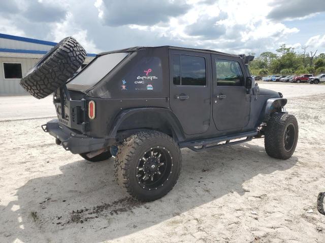 1J4BA5H10AL144027 - 2010 JEEP WRANGLER U SAHARA BLACK photo 3