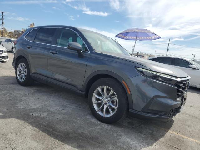 7FARS3H77PE011744 - 2023 HONDA CR-V EXL GRAY photo 4