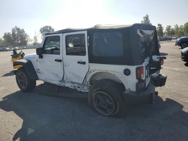1J4HA3H16BL567498 - 2011 JEEP WRANGLER U SPORT أبيض صورة 4