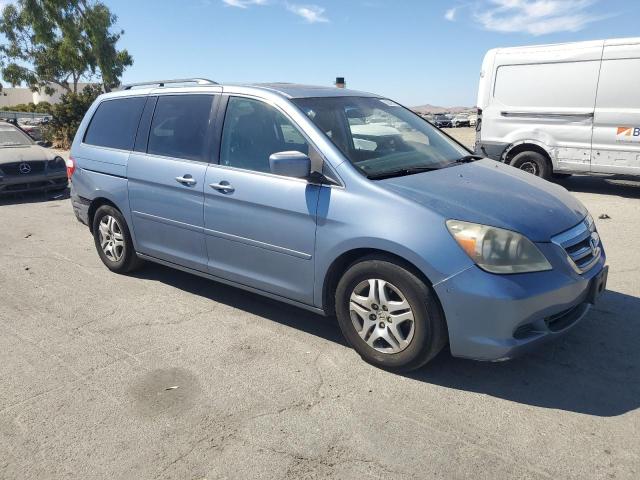 5FNRL387X5B133231 - 2005 HONDA ODYSSEY EXL BLUE photo 4